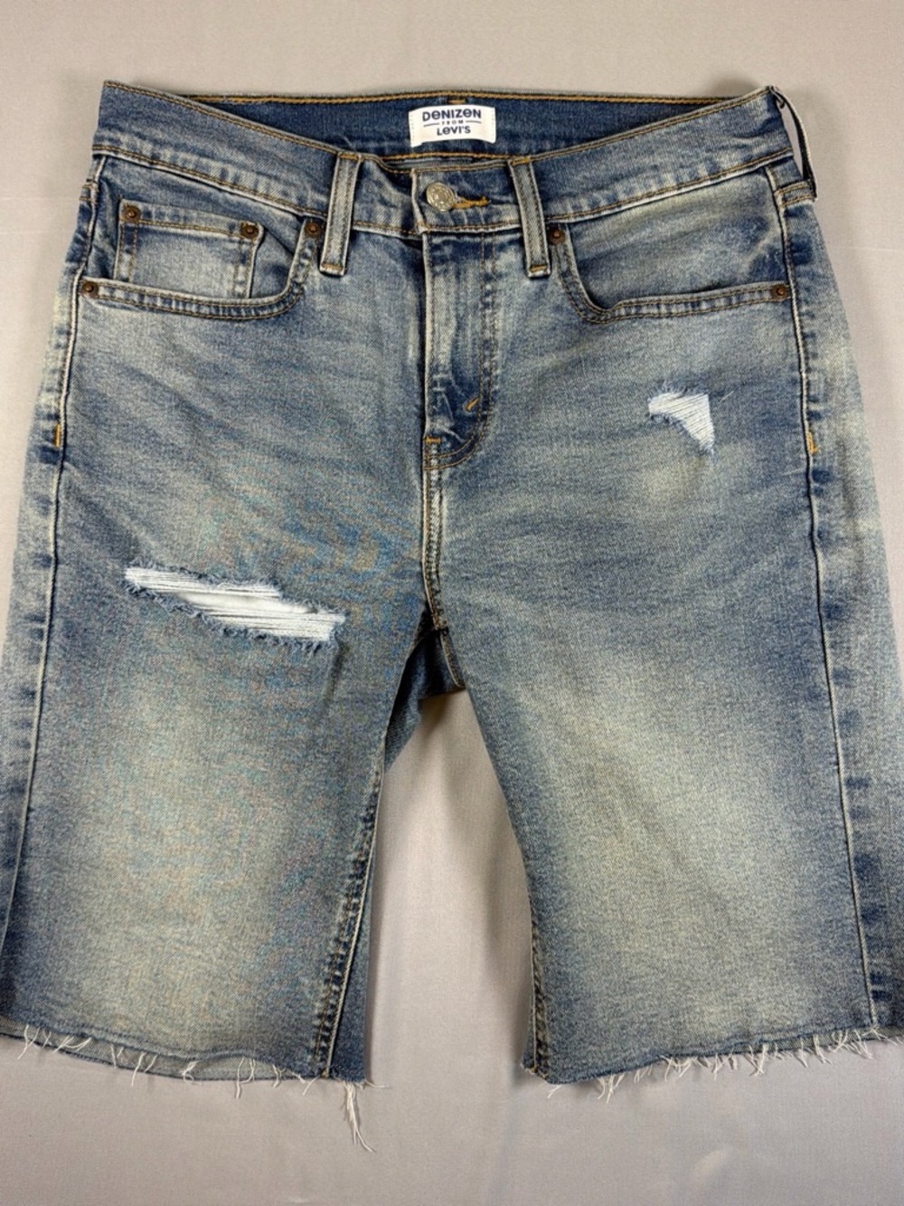 Denizen from Levi's faded blue distressed jean shorts